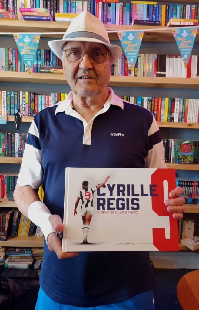 Laurie Rampling - Author and photographer Laurie Rampling with his book 'Cyrille Regis: Working Class Hero'